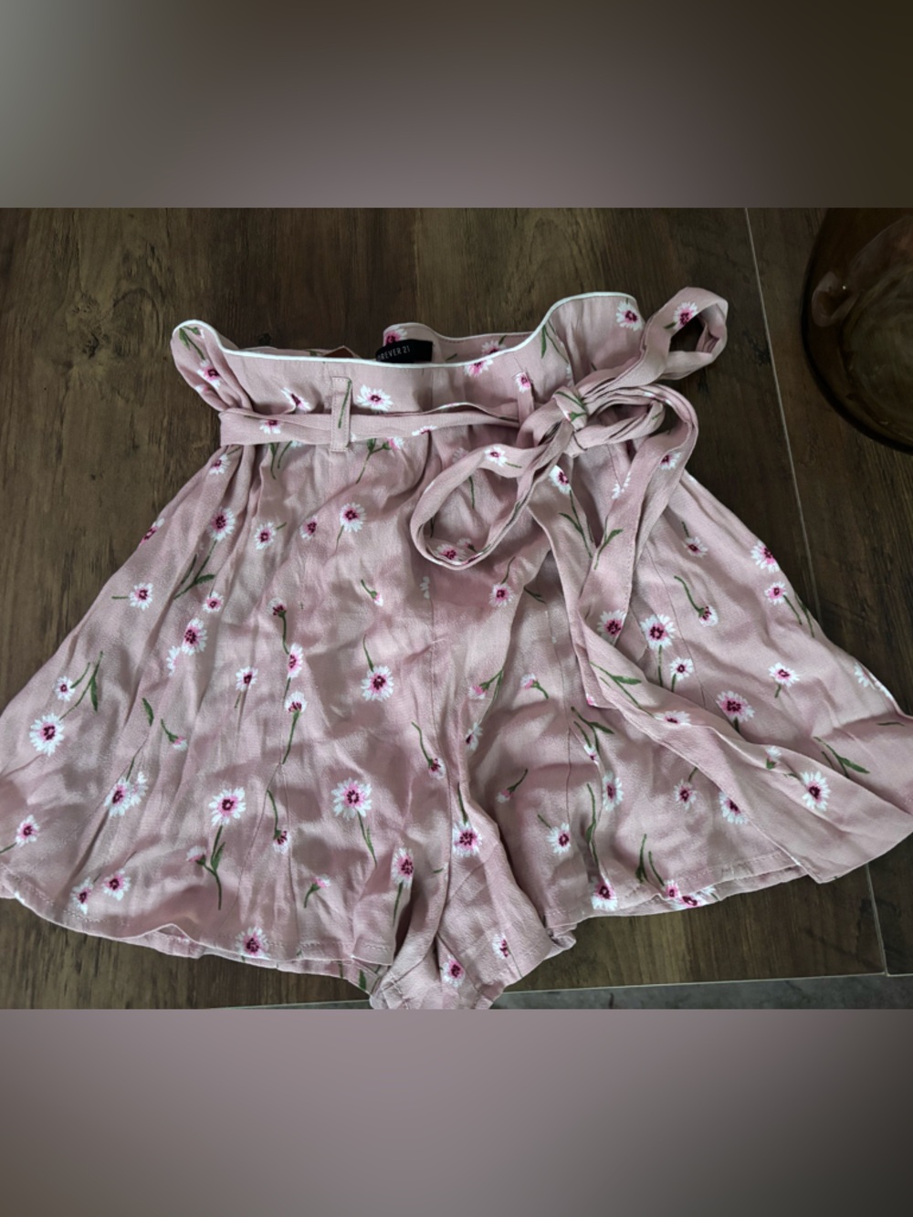 Pink flowy shorts with flowers
